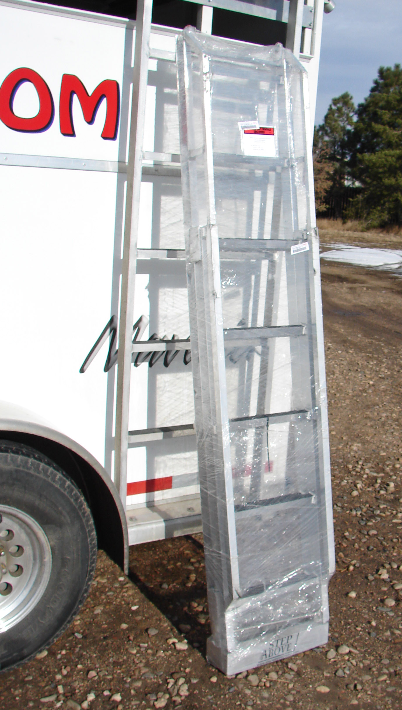 Step Above trailer extending aluminum ladder for horse trailers, race